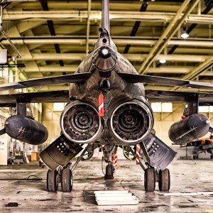 Extreme close-up of a SEPECAT Jaguar's nose cone, pitot probe, and engine intake