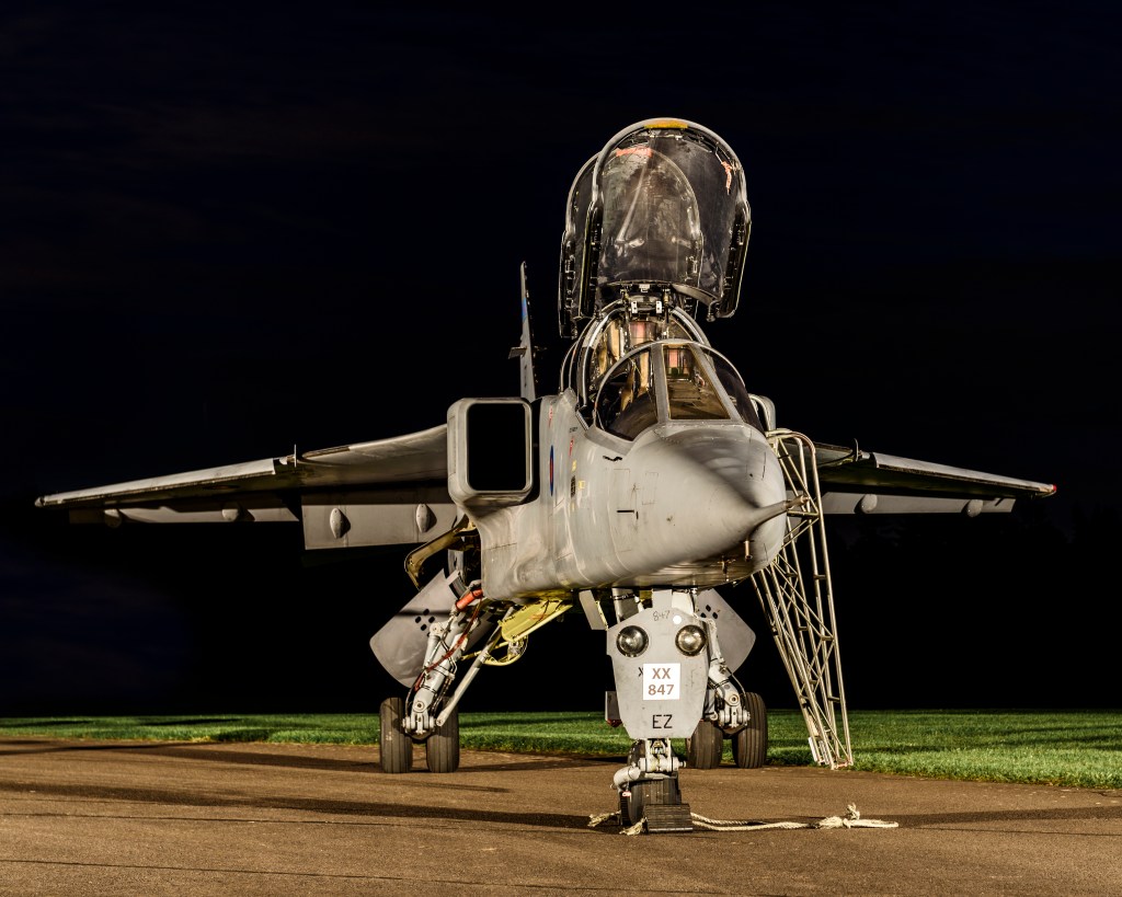 SEPECAT Jaguar T2 trainer XX847 with canopies raised, floodlit at night