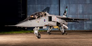 SEPECAT Jaguar XX835 with RAF Centenary markings on its tail, floodlit at dusk
