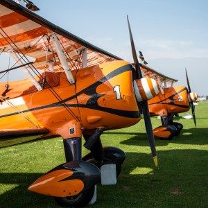 Pair of Boeing Stearman 75 biplanes of the AeroSuperBatics Wing Walker team at Duxford