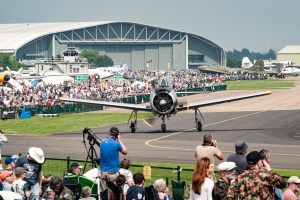 North American T-28 Trojan taxiing past the crowd line at Duxford
