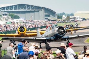 North American Harvard trainer aircraft taxiing for take-off at Duxford