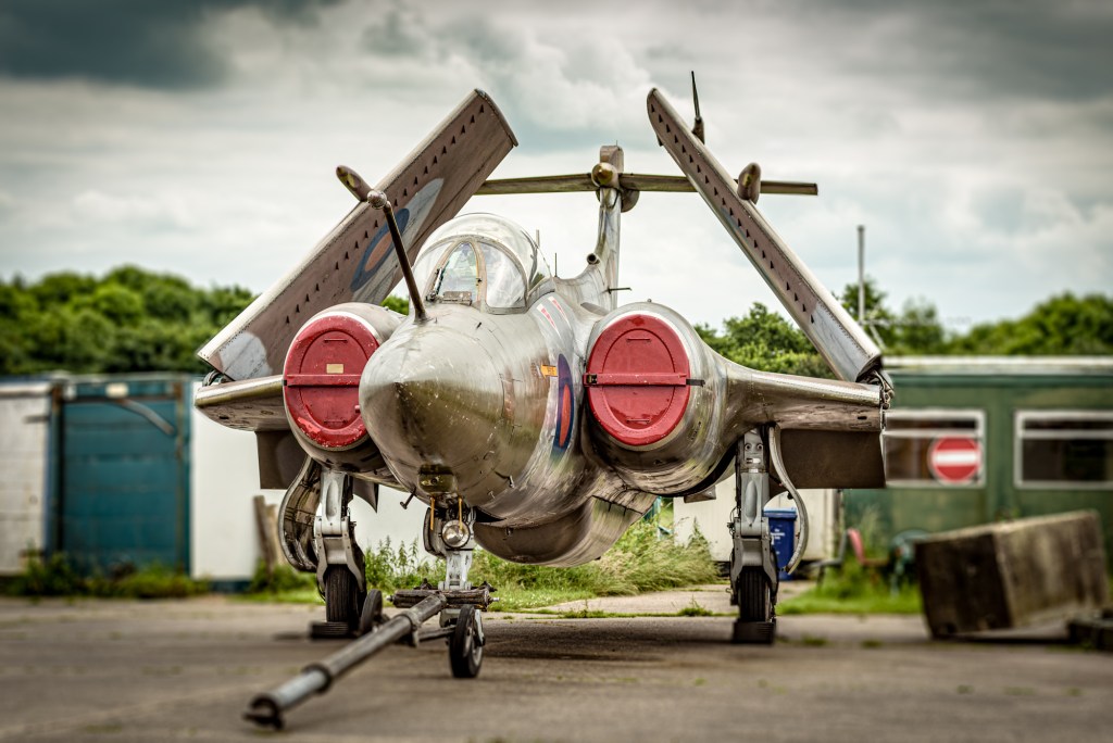 Nose-on view of Blackburn Buccaneer XX900 with wings folded and red intake covers fitted