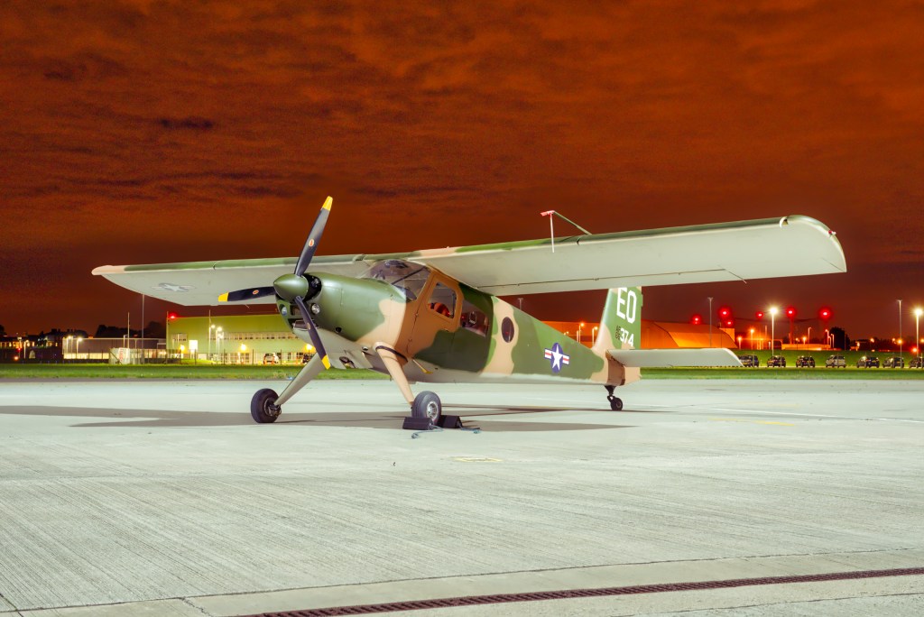Helio H-295 Super Courier G-BAGT painted as a Vietnam-era U-10B