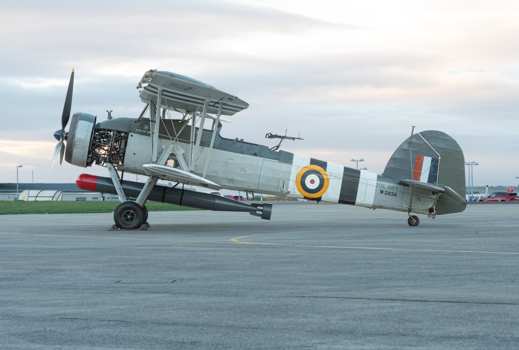 Fairey Swordfish W5856 side-on on the apron at RNAS Yeovilton in the last light of the evening.